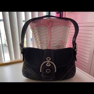 Women’s black Coach purse Barely used